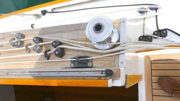 Close-up of the halyards and control lines in partial sunlight.