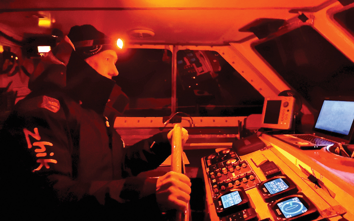 sailing-antarctica-nick-moloney-Ocean-Tramp-ketch-night-watch-helm