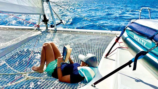 Sophie relaxing in the sun on the Bubb's catamaran adventure.